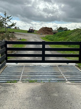 Load image into Gallery viewer, Aluminium gate with a view of a grassy area and sky