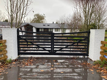 Load image into Gallery viewer, Black double swing aluminium gate on a white brick pillars with a house in the background